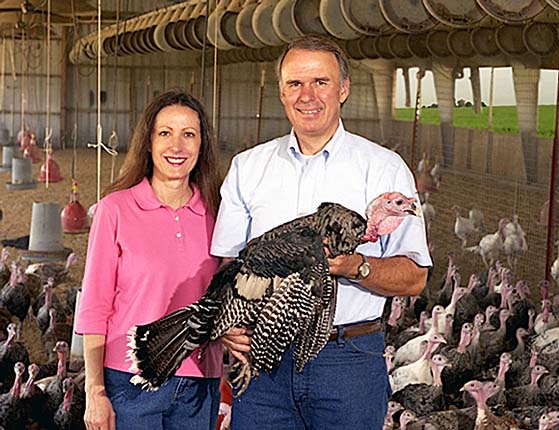 Picture of Owners of Mary's Turkeys with the Heritage Turkeys